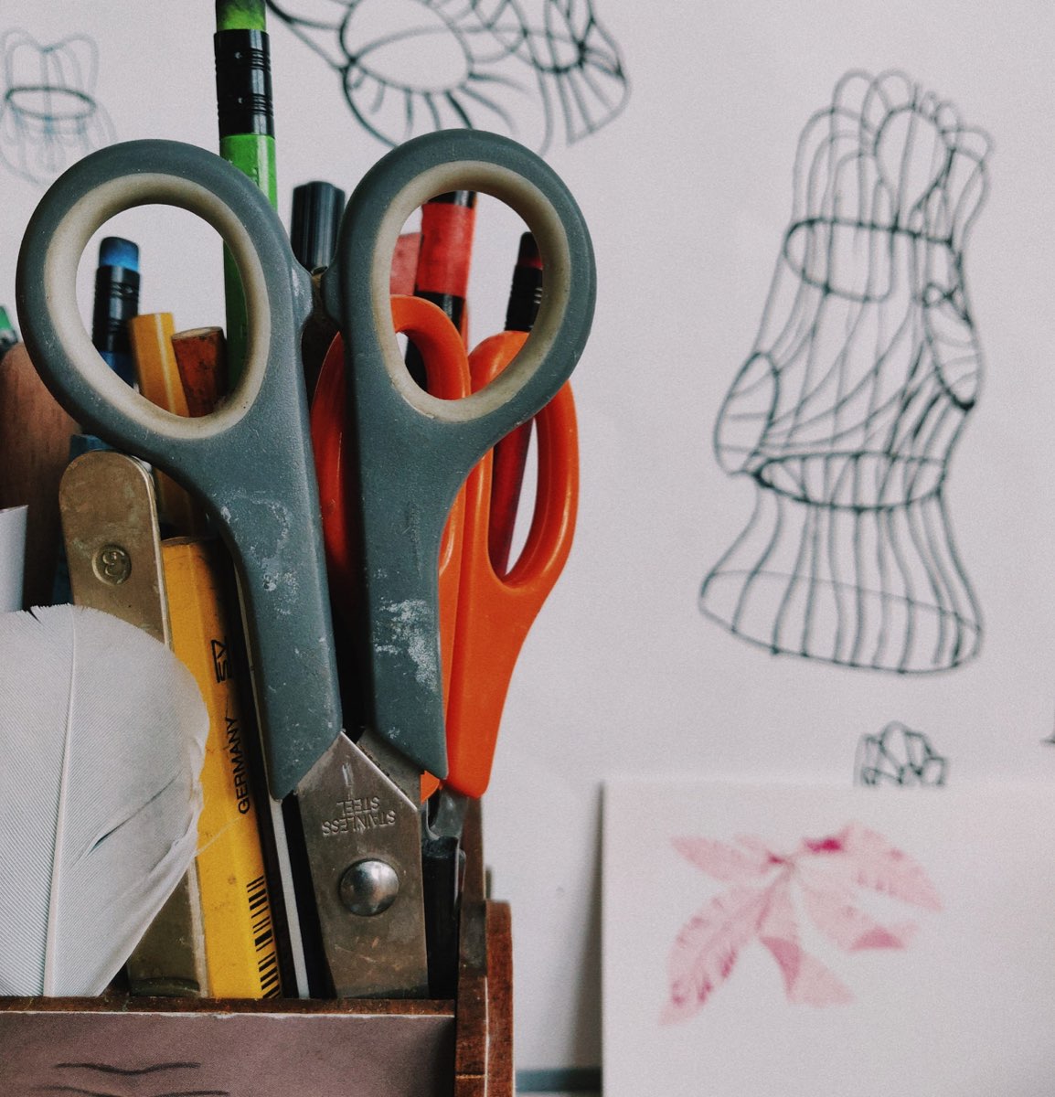 Household scissors in a desk pot
